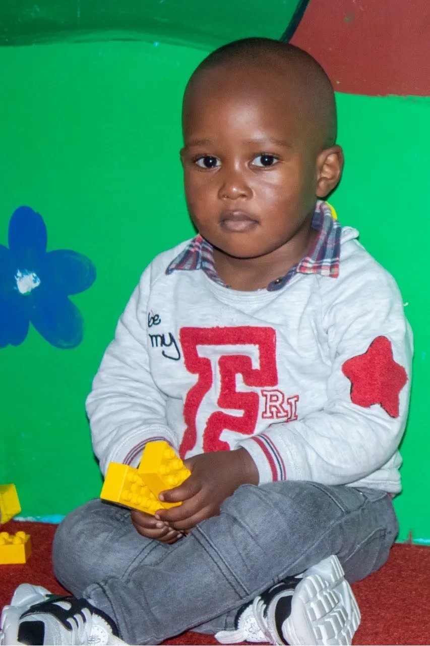 Young Cornelius Schools learner playing with building blocks